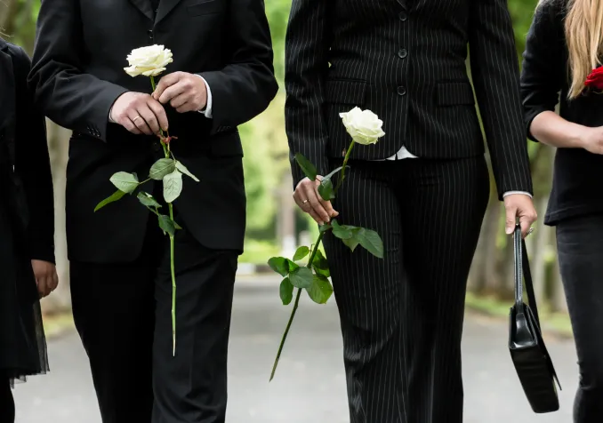 Une pasteure zurichoise invite des inconnus à un enterrement. IStock