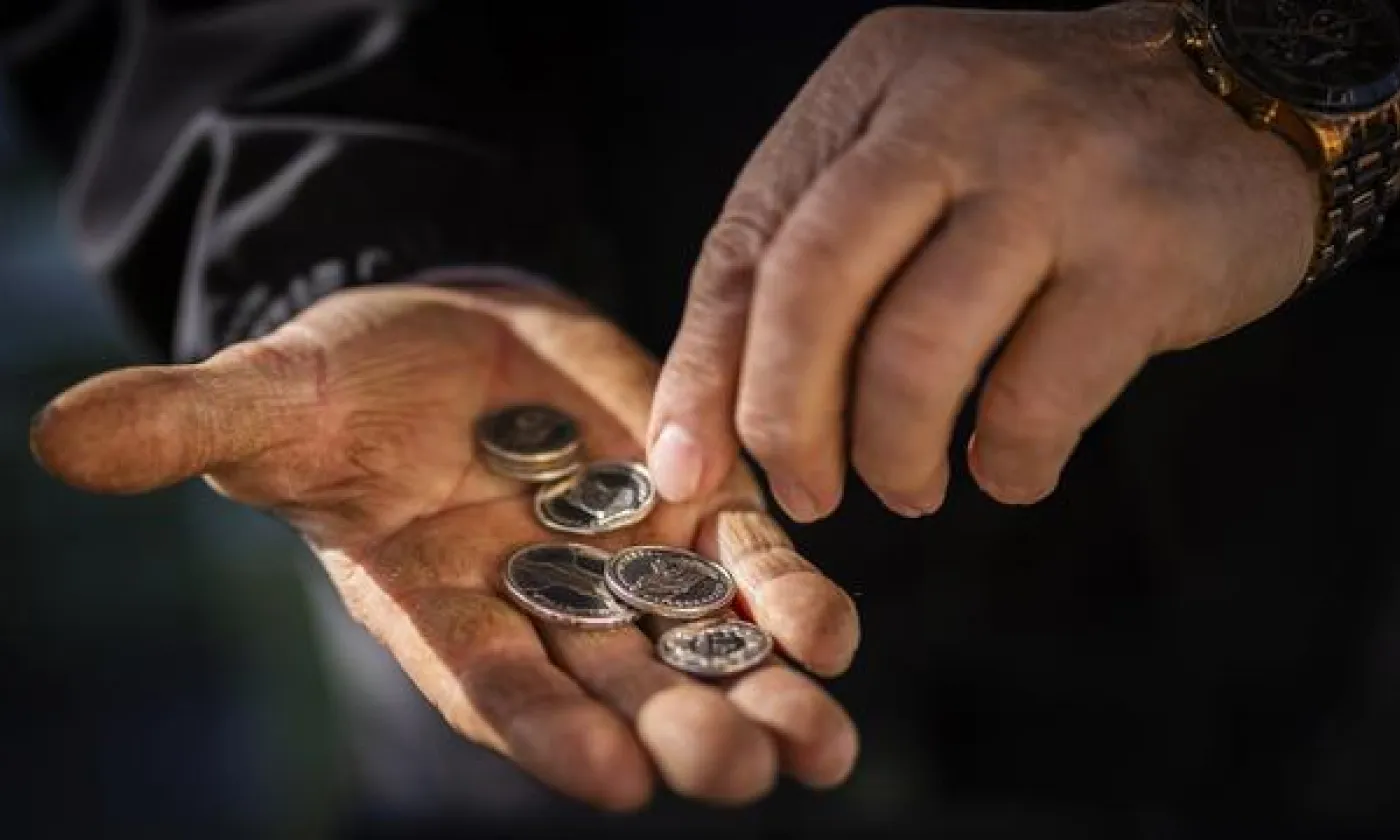 KEYSTONE - MICHAEL BUHOLZER Quand la religion guide les investissements financiers.