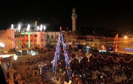 La Place de la Mangeoire, à Bethléem, lors des célébrations de Noël en 2011. / Keystone / Abed Al Hashlamoun