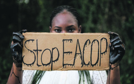 Une militante manifeste en Ouganda. / © CC(by-nc-sa) Impu/Lobby